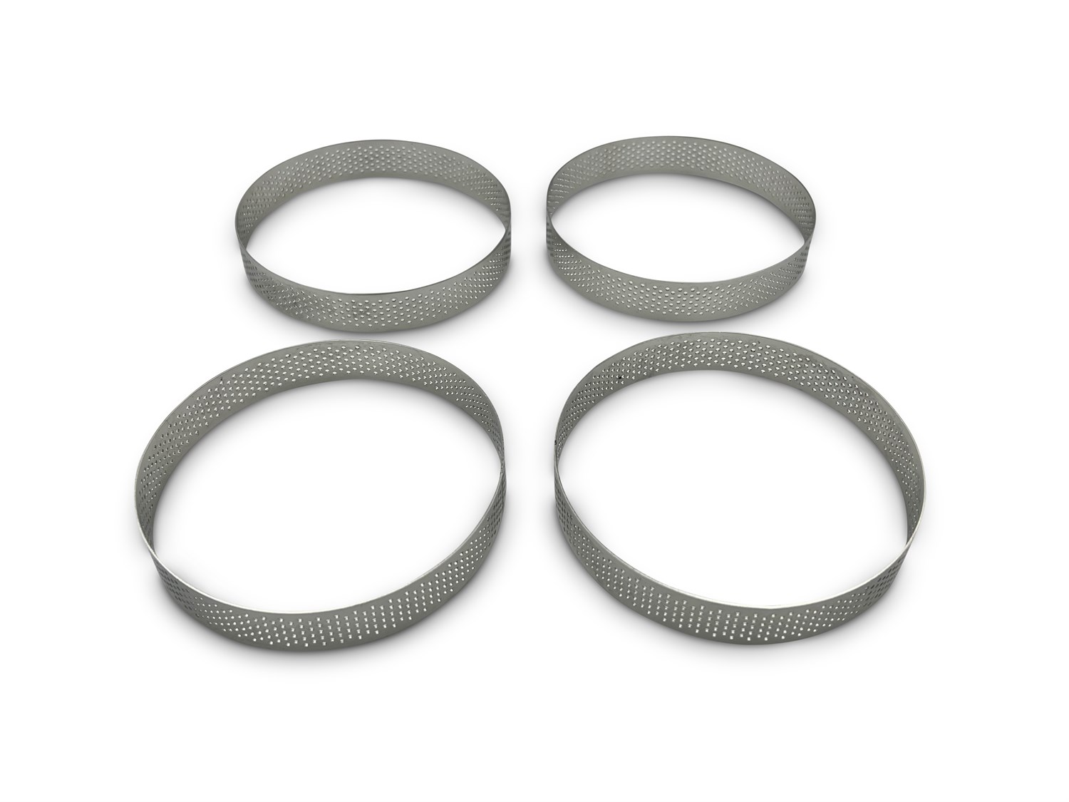 Perforeret tærtering, Ø 12 cm, 4 stk. fra Kokkens Køkkengrej – Hurtig levering